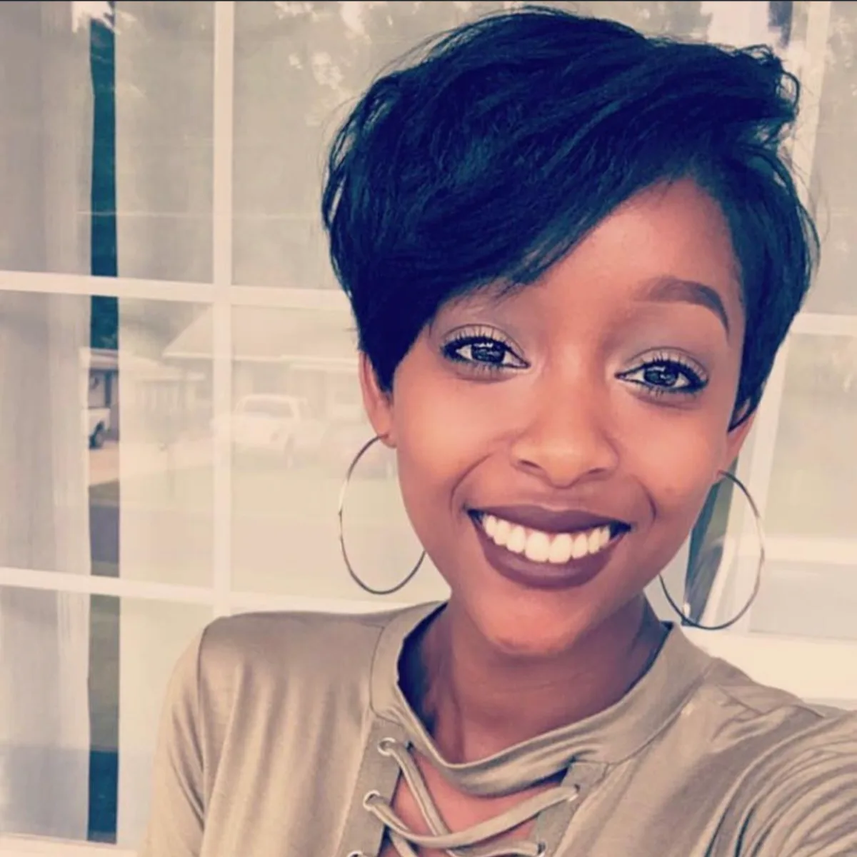 Soft tousled pixie style with warm tones