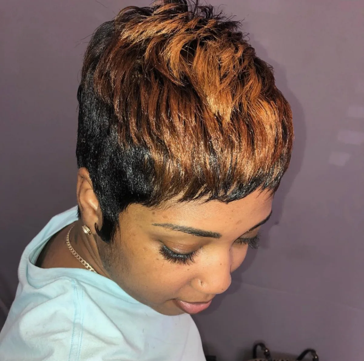 Short haircut styled with curls and texture
