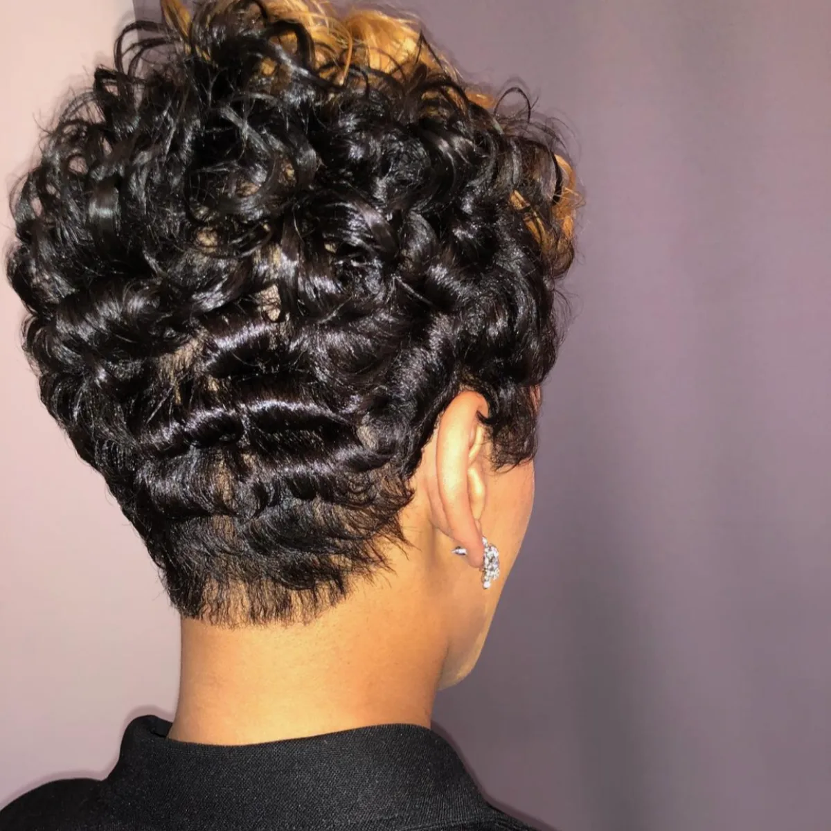 Modern layered pixie with face-framing pieces